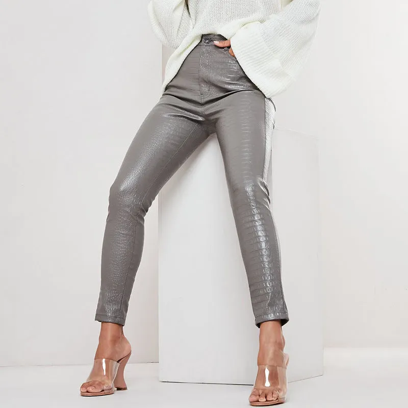 Carving Print Faux Leather Pants